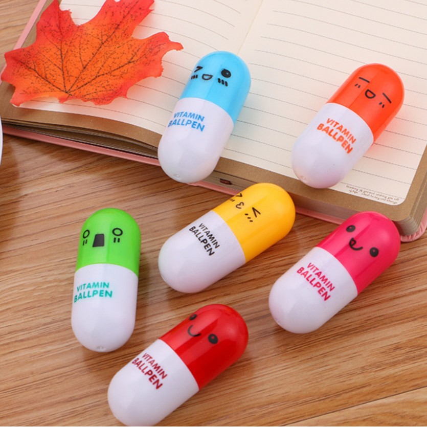 Nuevo japonés y coreano píldora pluma publicidad pluma lindo bolígrafo estudiante pluma retráctil papelería en stock dibujos animados