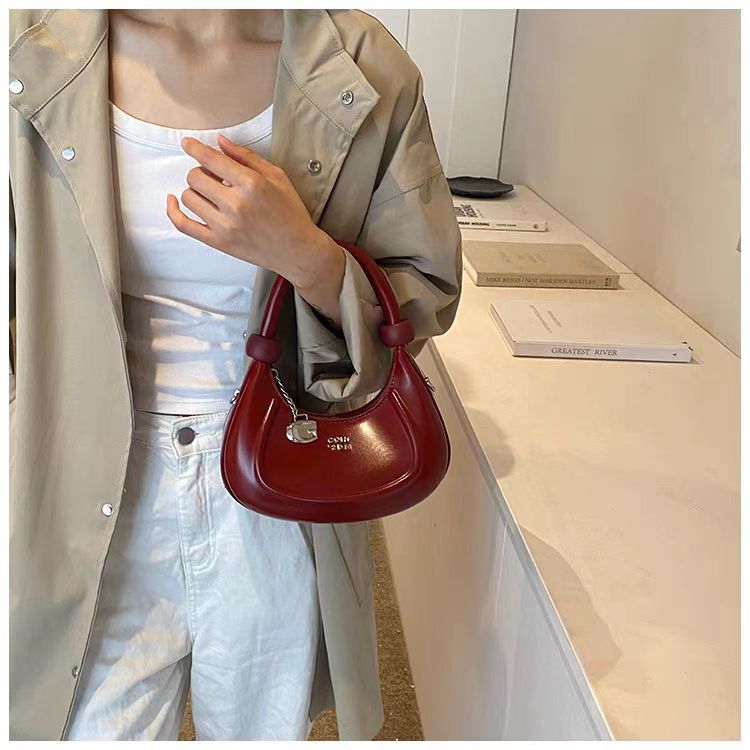 Women's Underarm Handheld Saddle Bag New Designer High-End Niche Retro Versatile Shoulder Crossbody Bag_voghion.com