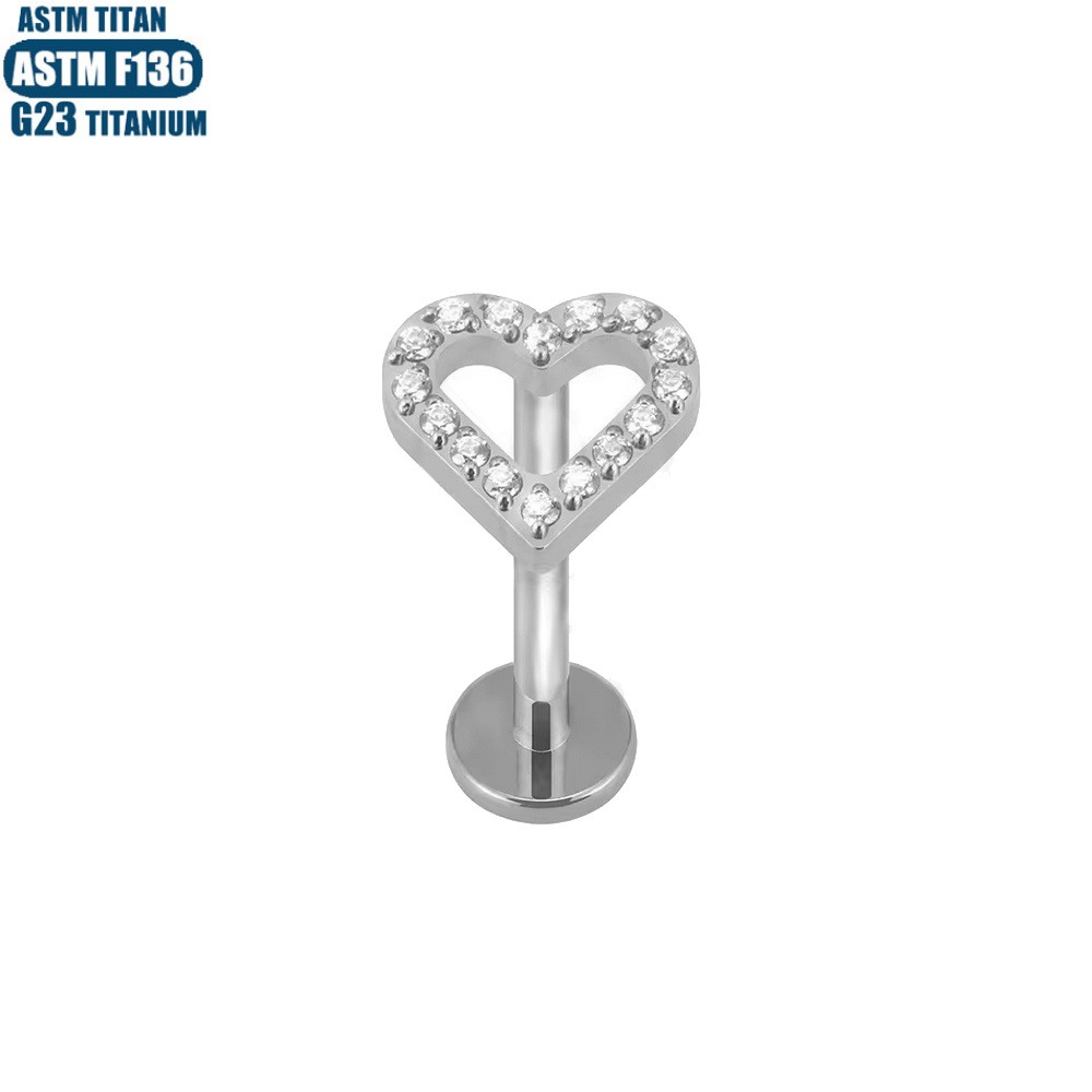 Silver pointed spike labret stud material detail