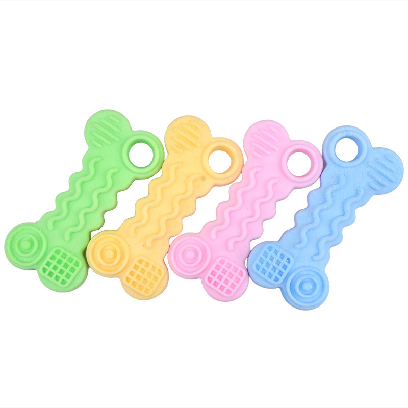 Fabricante perro juguete TPR leche sabor espuma curva hueso mordedura molar galleta juguete suministros