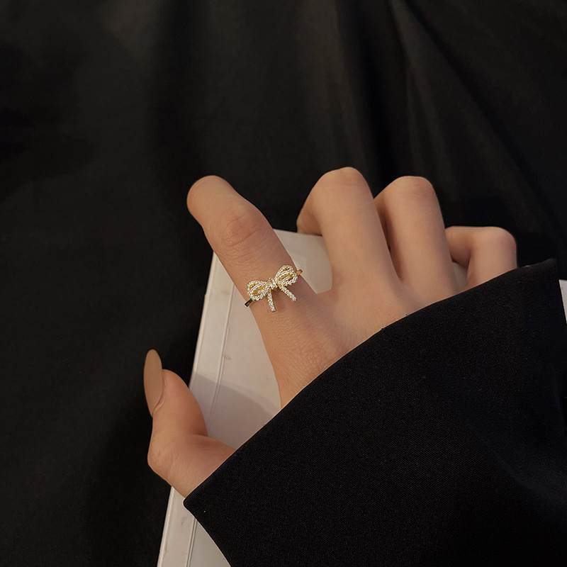 Small design fashionable adjustable ring with bow