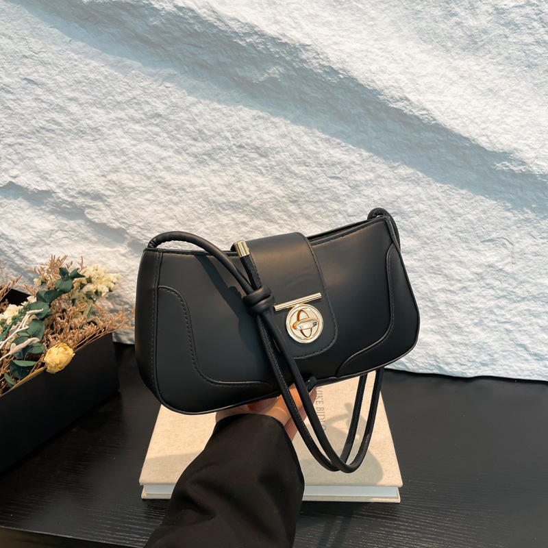 Bolsos debajo de las axilas mujeres 2024 invierno nueva moda de nicho simple diseño de hombro bolso retrógrado bolso pequeño