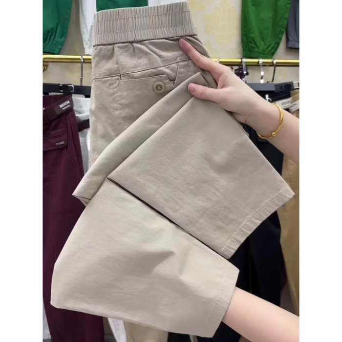 ヨーロッパの商品の夏の薄いタイプの9分のズボンの女性の新型の高弾性の綿のゆったりしている腰のハーレムのズボンの百合はやせているおばあさんのズボンを現します。|undefined