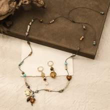 秋冬新款琥珀流光虎眼石天然石编织长毛衣链复古精致小象叠戴项链