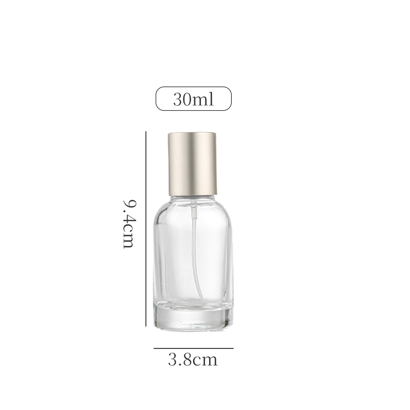 Envase de perfume vacío, botella de spray de alta gama, botella de perfume recargable de vidrio transparente de 30 ml, sensación de alta gama, listo para venta al por mayor.