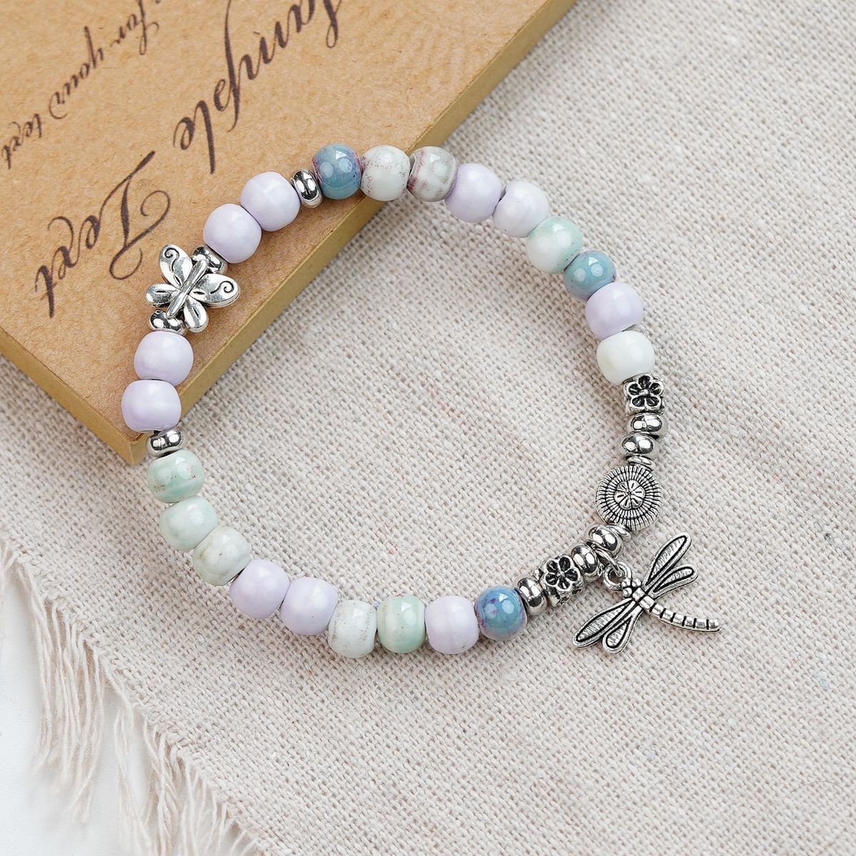 Jingdezhen pulsera de cerámica de verano mujer alta sensación galletas serie de gatos nicho diseño universal pulsera alta sensación