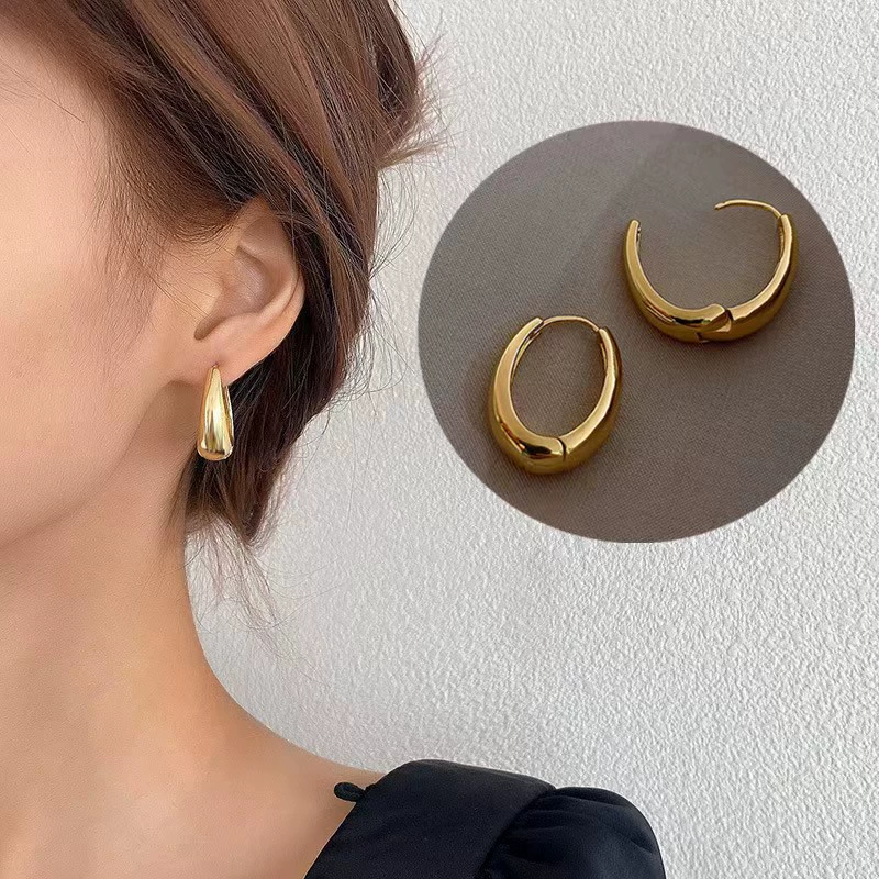 Retro glossy metal fashionable brand earrings, light luxury style, simple and elegant design, internet celebrity