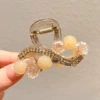 Round beads, mountain tea, crab pin