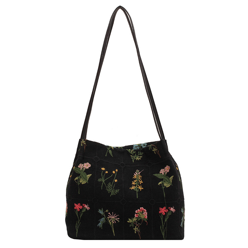 Bolso de mano bordado de gran capacidad para las mujeres 2024 primavera y verano nuevo nicho lienzo bordado bolso de cubo de cercanías