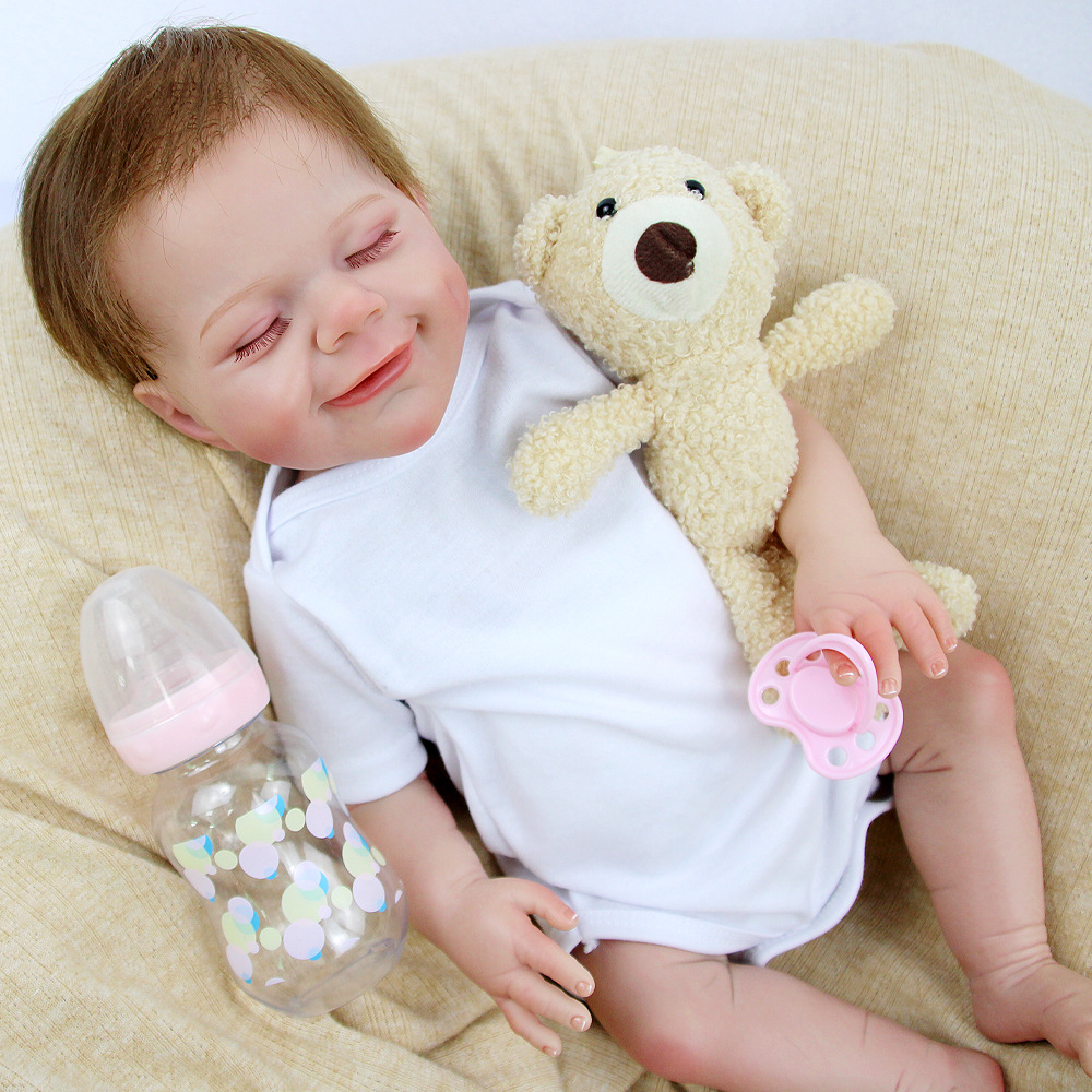 En stock 18 pulgadas ojos cerrados Smiley cara renacido muñeca suave vinilo simulación bebé acompañar niños juguete muñeca