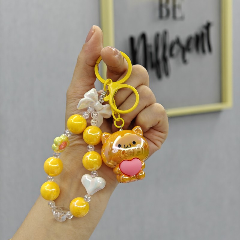 Galvanoplastia abrazo amor oso con cuentas llavero colgante acrílico muñeca colgante garra máquina muñeca regalo al por mayor