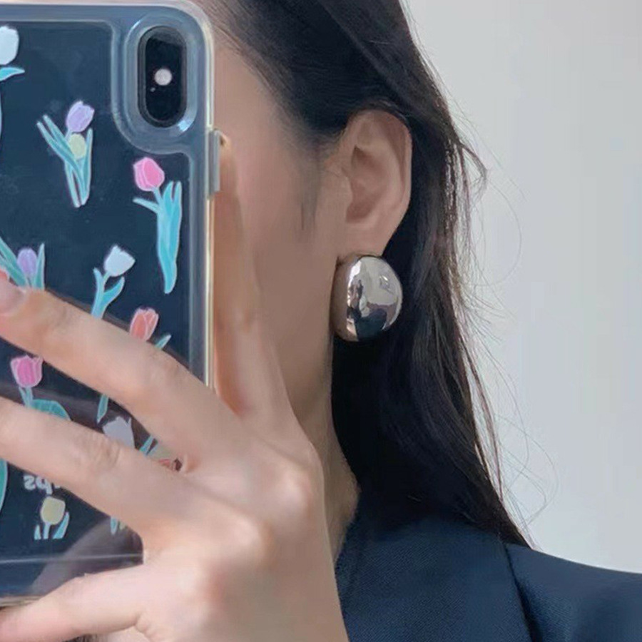 Europa y América oro oval bola grandes pendientes hembra nicho diseño de alto grado frío estilo exagerado metal hebilla oreja