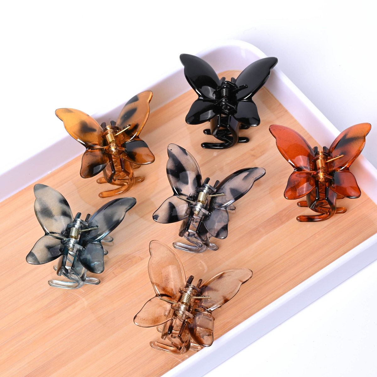 Clip de agarre de mariposa super inmortal nuevo clip de cabello de cristal de peces de tiburón para mujeres celebridades en línea ins clip de cabello de tiburón tocado transfronterizo