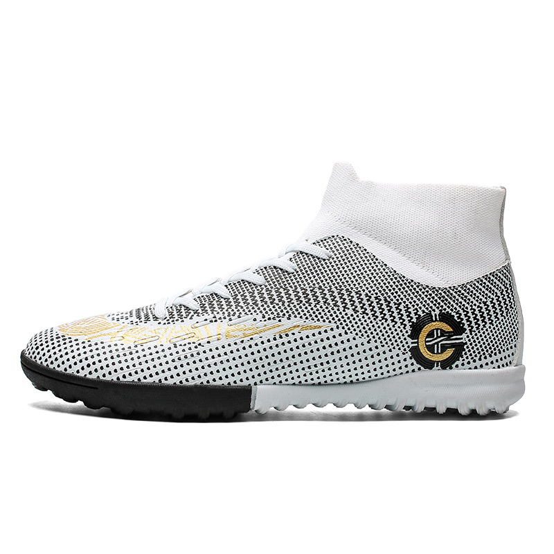 Zapatos de fútbol al por mayor más el tamaño alto de los hombres zapatos de uñas rotas para niños superficie de cuero pegamento de uñas largo más el tamaño de los adolescentes pies de la zapatilla de deporte