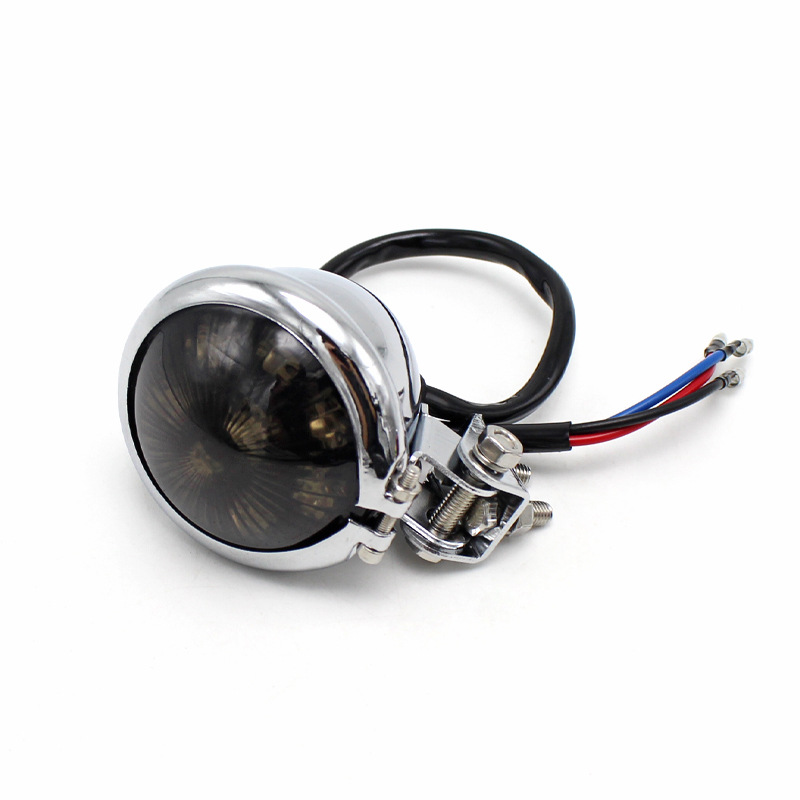 Accesorios de la motocicleta retro modificado crucero Príncipe locomotora metal redondo pequeña luz trasera luz freno LED Universal