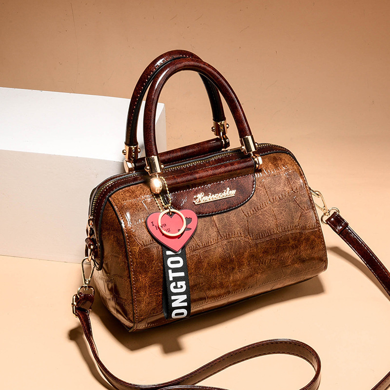 Bolso de textura 2025 nuevo bolso de hombro con diseño de patrón de piedra, bolso de mensajero universal de asistencia informal, bags transfronterizos