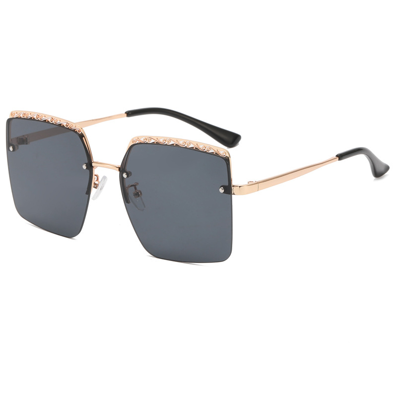 Primavera de fábrica nueva Europa y América transfronteriza Sun Festival frameless recort-out metal gafas de sol personalizadas