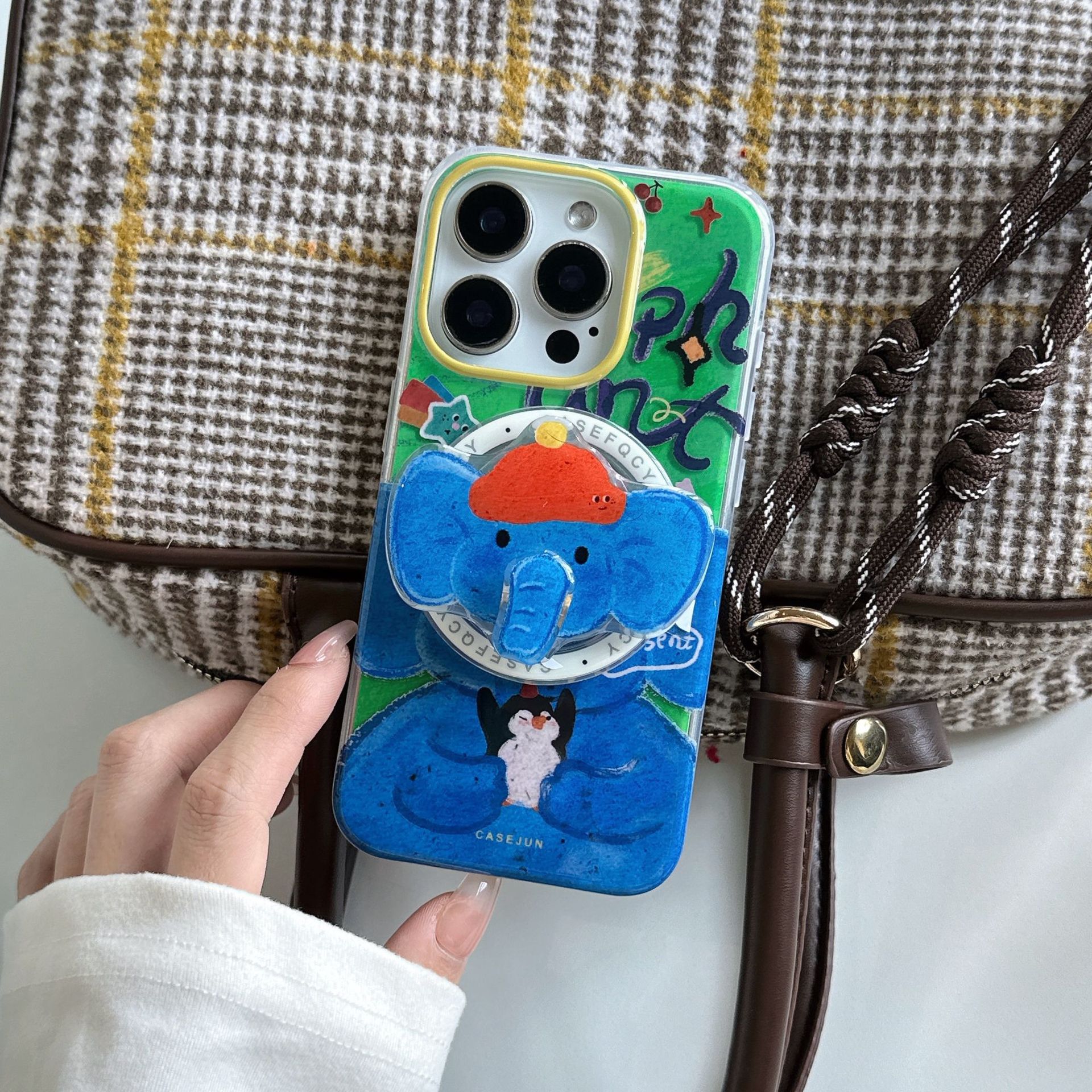 Soporte de nariz de elefante giratorio creativo para Apple 16promax funda para teléfono móvil iPhone15 nuevo 14 atracción magnética