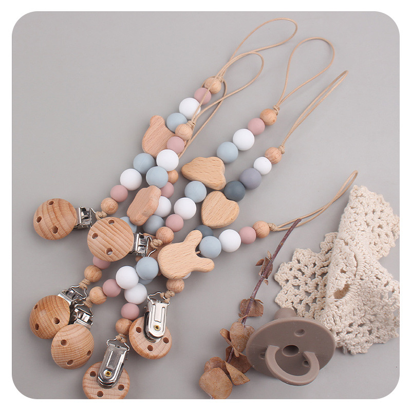 Productos para bebés y niños pequeños clip de chupeta creativo bebé dibujos animados juguetes de beech mordida de dientes molares chupeta cadena anti-caída cadena