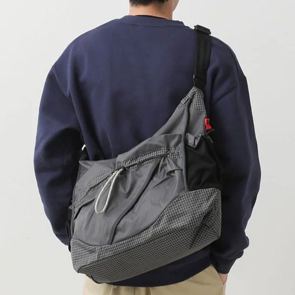 Universal shoulder bag for traveling for men and women