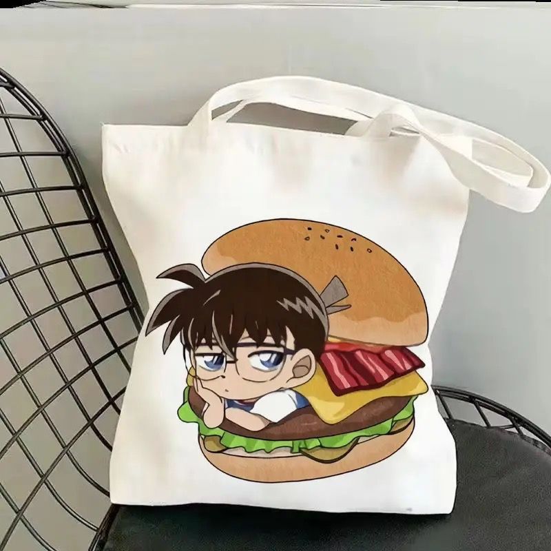 Conan alrededor de los estudiantes bolsas de lona animación de dos dimensiones de gran capacidad de alto valor para salir al trabajo bolsas de hombro bolsas de estudio