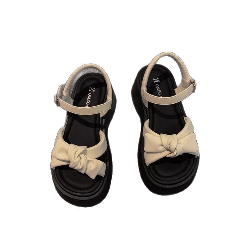 Sandalias de arco francés para mujeres 2026 nuevo estilo de verano con una sola gorra de moda con una falda de playa sandalias de hebilla
