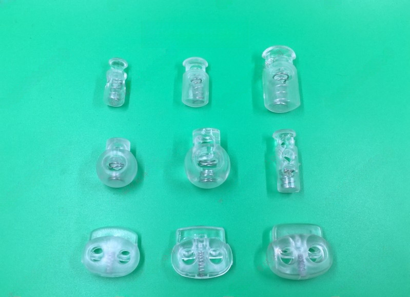 Single hole double hole black and white plastic spring buckle elastic buckle rope buckle pig nose buckle