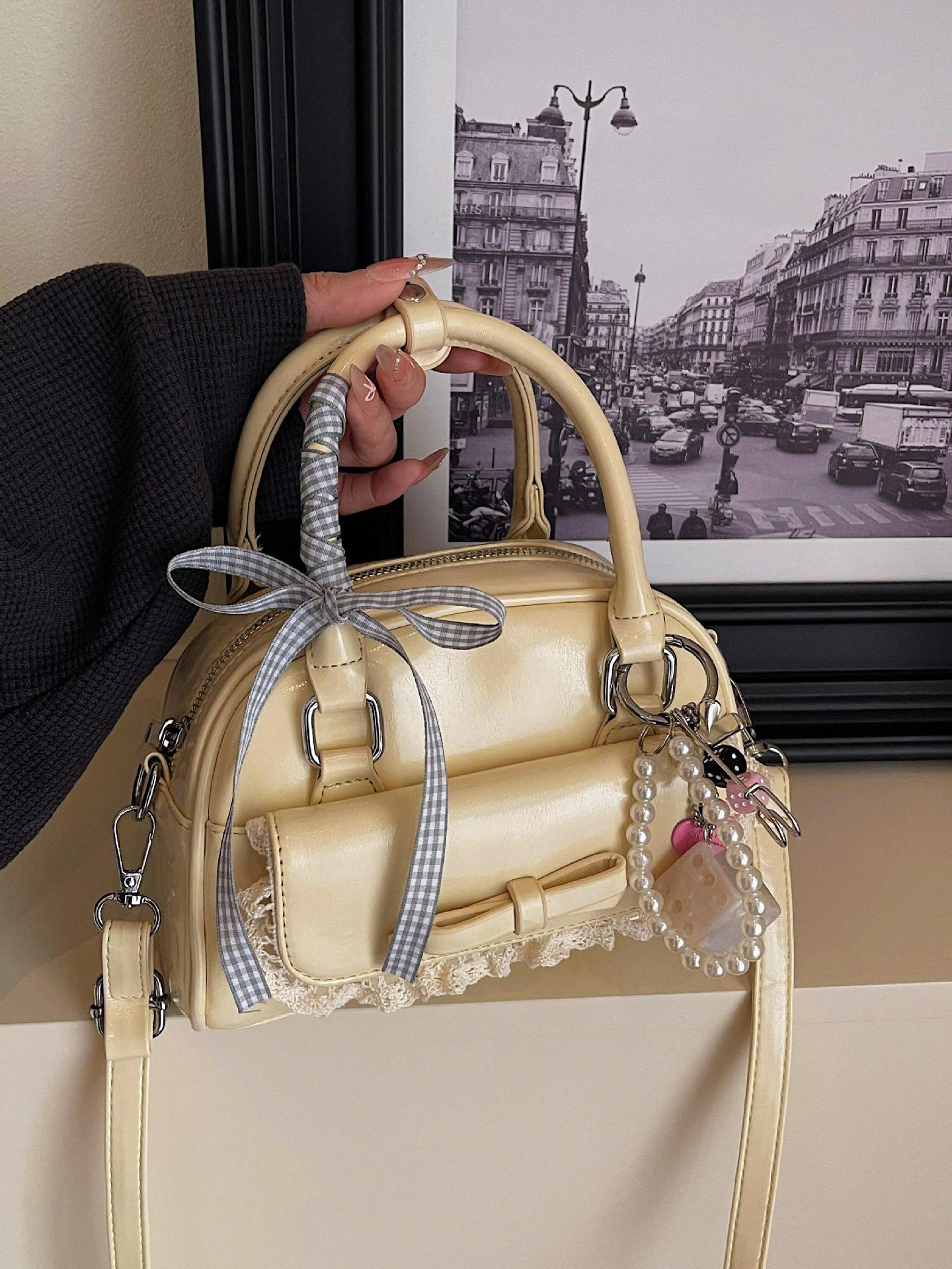 Bolsos pequeños portátiles populares de este año para mujer 2025 nueva moda bolsa de mensajero estilo occidental bolso de hombro casual coreano