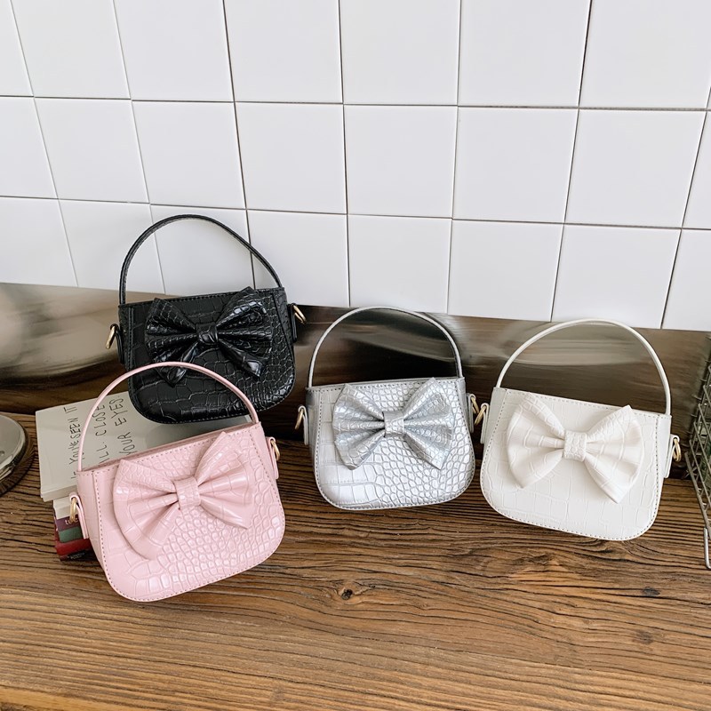Dulce pequeño fresco bolso de hombro infantil lindo arco de color sólido bolso para padres e hijos nuevo bolso de accesorios para niñas