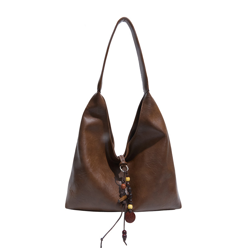 2025 invierno nuevo estilo de alta calidad bolsas de brazo coreanas de moda de gran capacidad bolsas de mano bolsas de hombro retro de viaje de mujer