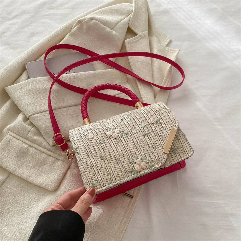 Diseño de nicho de alta sensación de tejido pequeño bolso cuadrado para mujeres 2024 nueva moda de paja bordada mochila de hombro