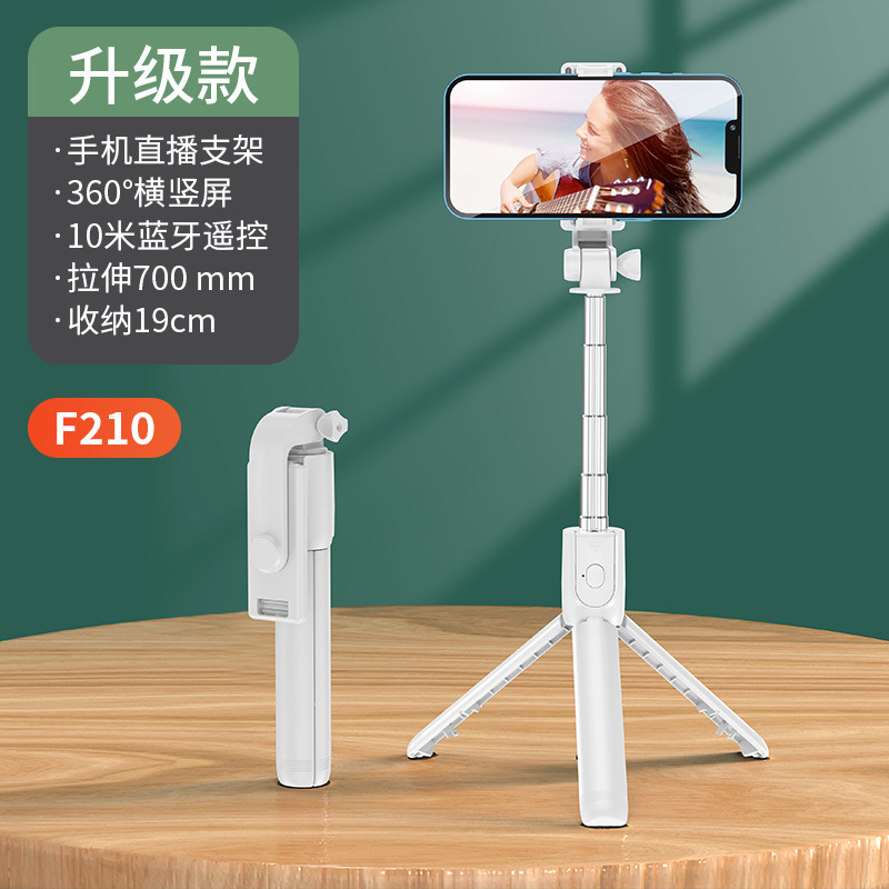 Ventas directas de fábrica teléfono móvil Bluetooth selfie stick trípode llenar luz selfie stick mini portátil de mano Cámara artefacto