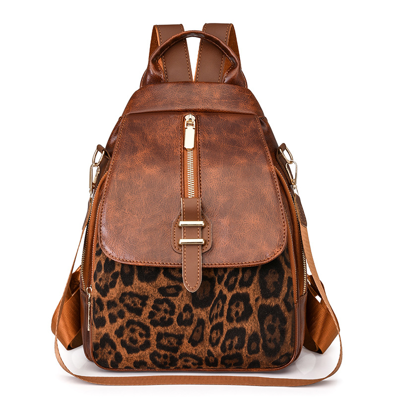 2025 primavera nuevo comercio exterior retro mochila casual impresión de tendencia de contraste de color moda al aire libre versátil gran capacidad