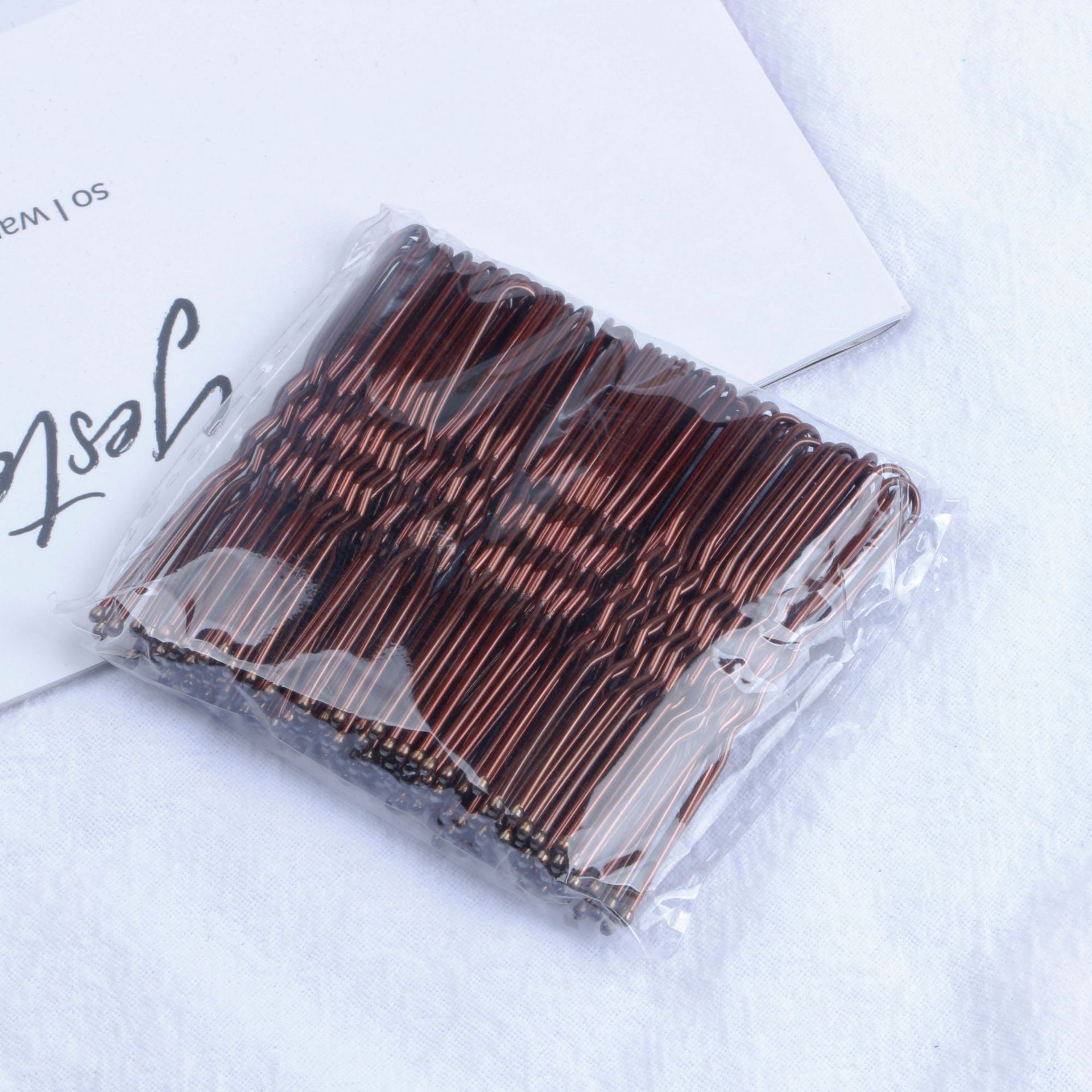 Europeo y Americano en forma de U clip de la cabeza de la bola pin tocado negro estudio updo herramienta en forma de U de horquilla de clip de acero fijo