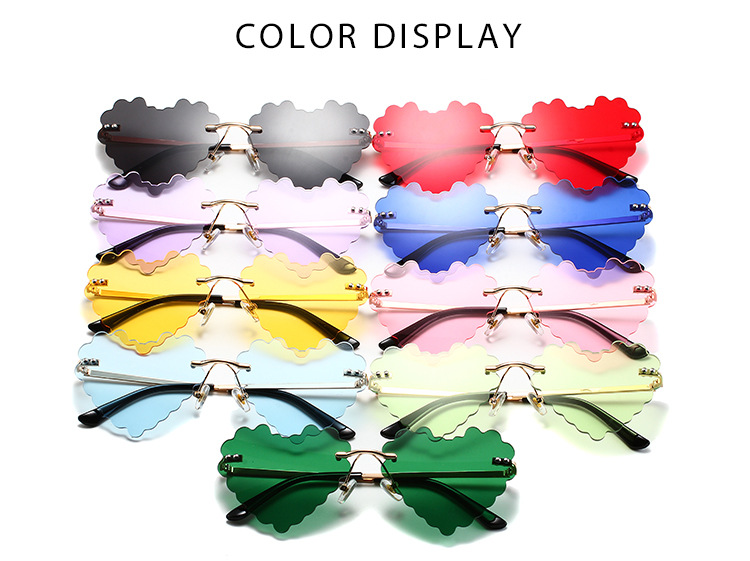 60g Weight Frameless Glasses Structure Sunglasses Classification PC, UV400 Protection, Tinted Lenses Lens Material Special-Shaped Mirror Glasses Style Outdoor, Travel, Beach Occasion Heart Shape Pattern All Seasons Season Women's Gender Novelty, Classic Style Style Novelty Classic Style Heart Shape PC UV400 Protection Tinted Lenses Special-Shaped Mirror Frameless Women's Sunglasses 3