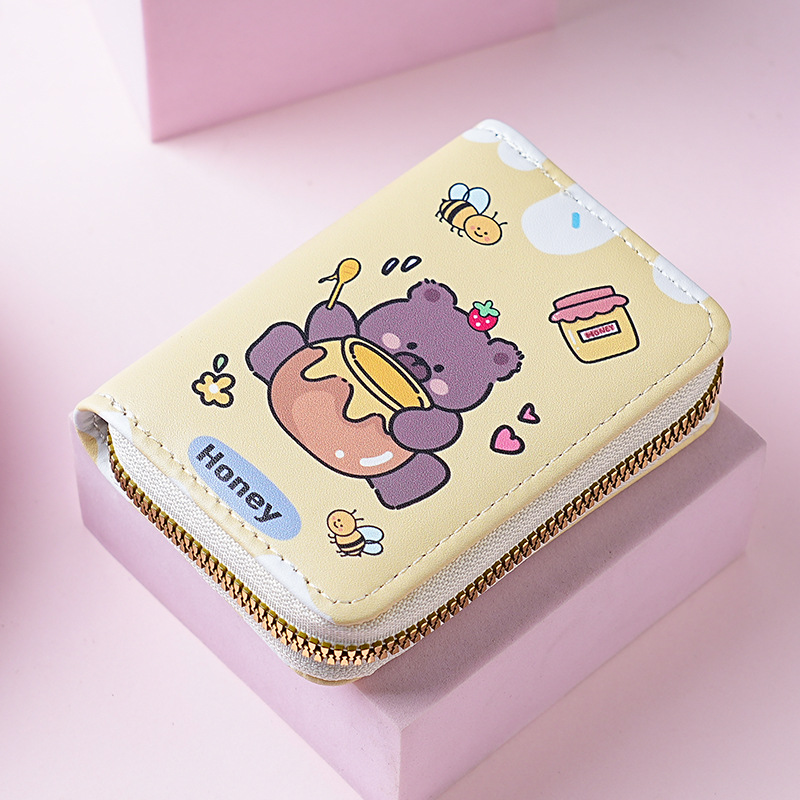 Estilo japonés lindo creativo mini órgano titular de la tarjeta de gran capacidad Multi-tarjeta de dibujos animados hembra anti-desgaussing titular de la tarjeta bancaria