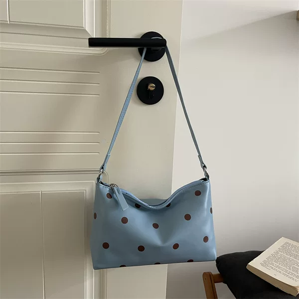 Korean-style niche design shoulder bag 2026 new model casual simple stylish polka dot commuter versatile underarm handbag