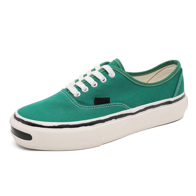 Zapatos de lona zapatos individuales clásicos de alta gama para hombre 2025 verano nueva moda todo fósforo zapatos casuales de corte bajo al por mayor