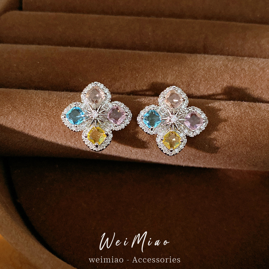 Agujas de plata de color de piedra de silicio pernos de orejas de flor temperamento simple personalidad pendientes de orejas de lujo ligero alta sensación de orejas al por mayor image 1