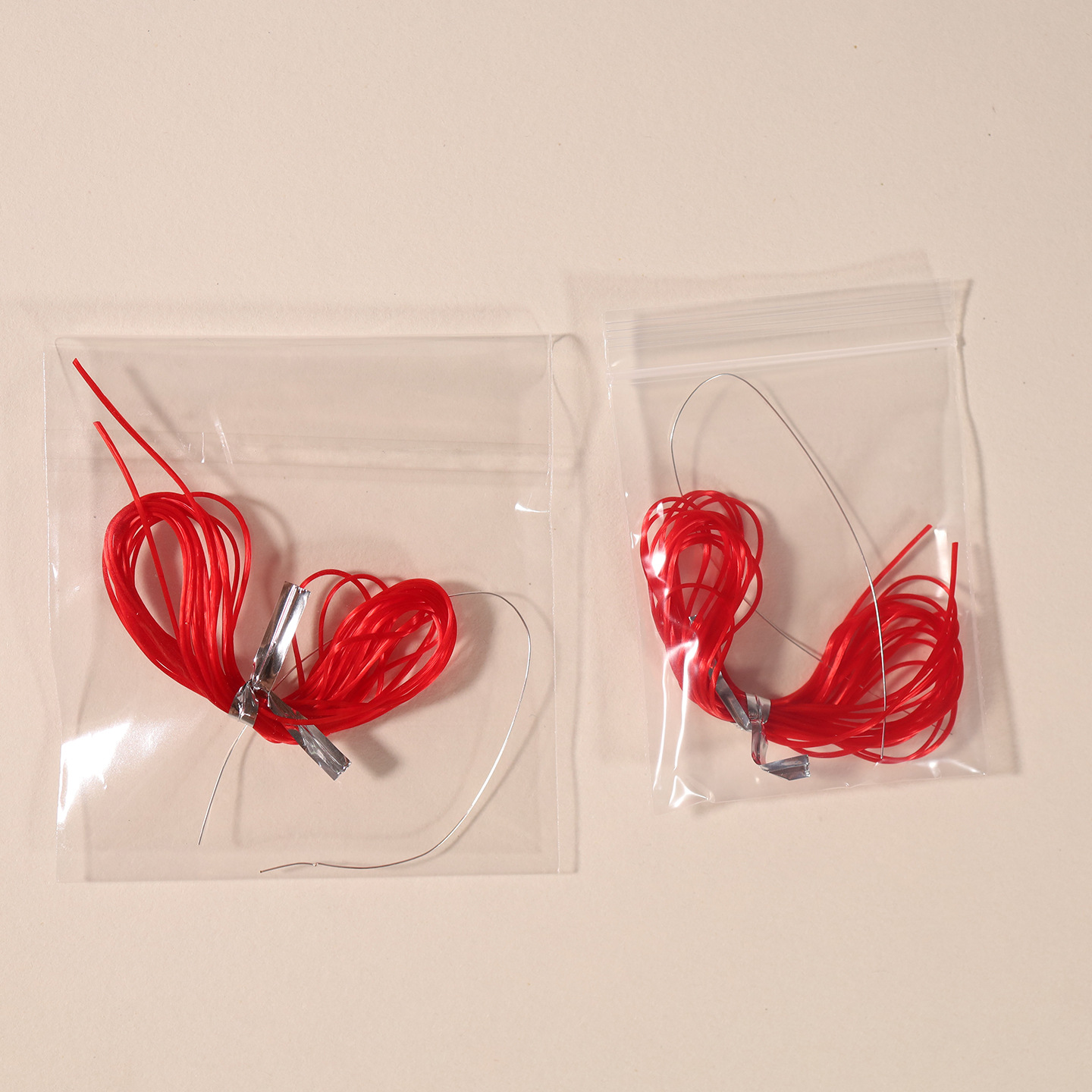 批发中国红正红色扁丝线电商赠品线包朱砂用线PE袋OPP袋独立包装