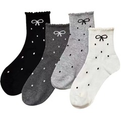 靴下の女性の波の点の蝶結びの秋冬の金の積み重ねの靴下のinsの中の筒の日本のネットの赤いかわいい女性の長い筒の花の辺の靴下