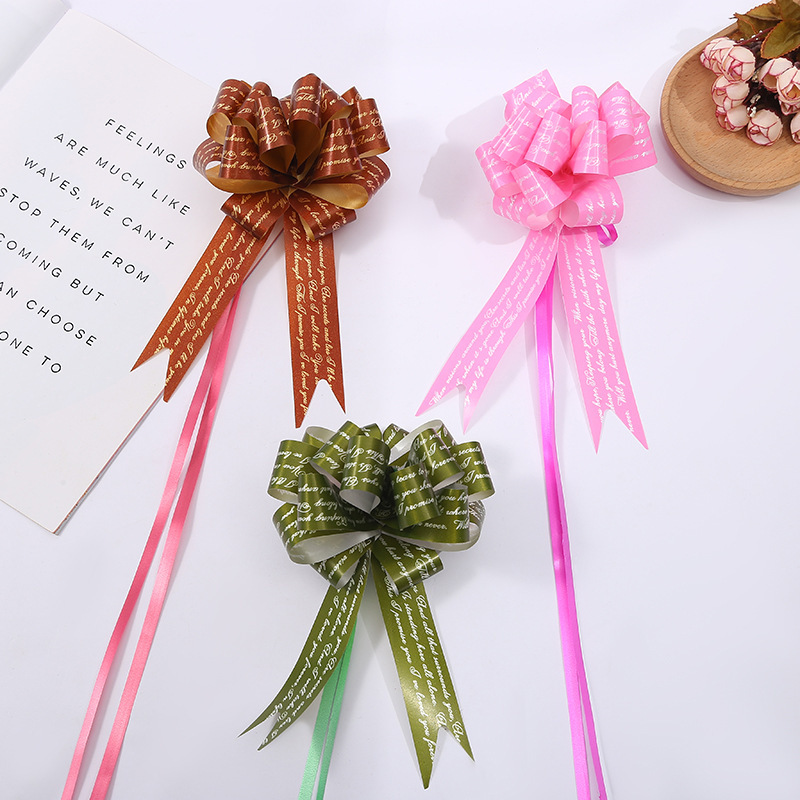 Nuevo embalaje de regalo de Navidad transfronterizo 30 letra mediana Blanco macaron multi-estilo Flor de extracción de mano Flor de nueve secciones multi-color