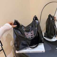 バッグ2025女性バッグ新型ファッションシンプル蝶刺繍トートバッグ韓国版大容量シングルショルダーバッグ