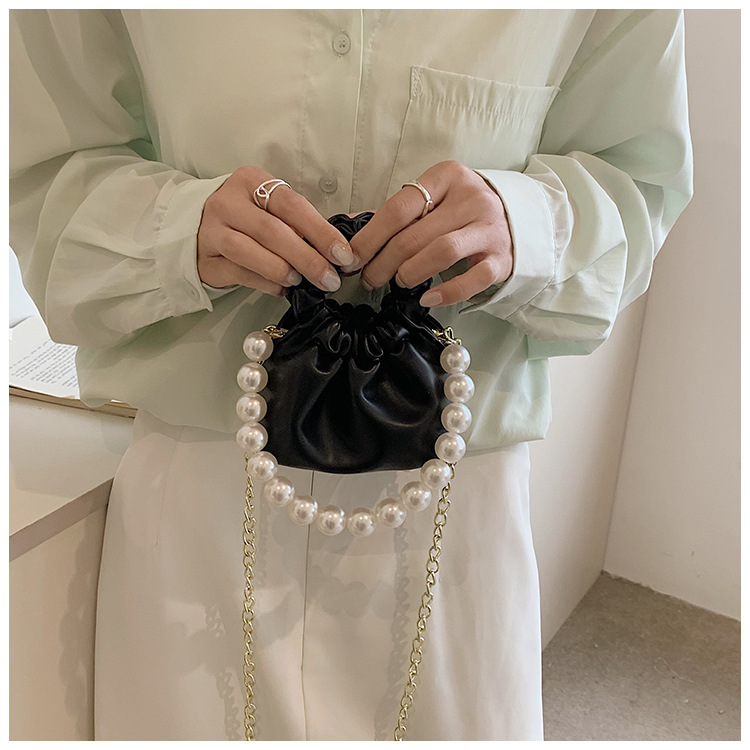 255g Weight Beading, Pearls Fashion Element Clasp Frame Closure Type Top Handle, Chain Strap Type Crossbody Bag Bags Type Casual, Daily, Shopping Occasion Pu Leather Material Solid Color Pattern All Seasons Season Kid'S Gender Cute Style Bucket Shape Kid'S Pu Leather Solid Color Cute Beading Pearls Bucket Clasp Frame Crossbody Bag 39