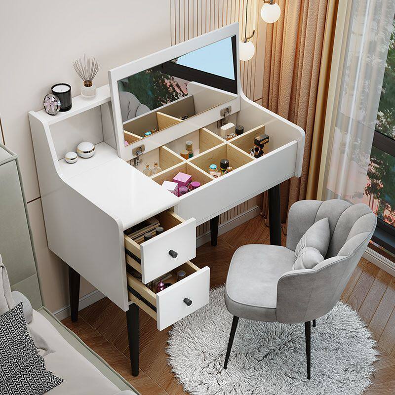 Comodador de dormitorio moderno y simple espejo de casa pequeña puede ocultarse tipo plegable con escritorio de lámpara en una mesa de maquillaje