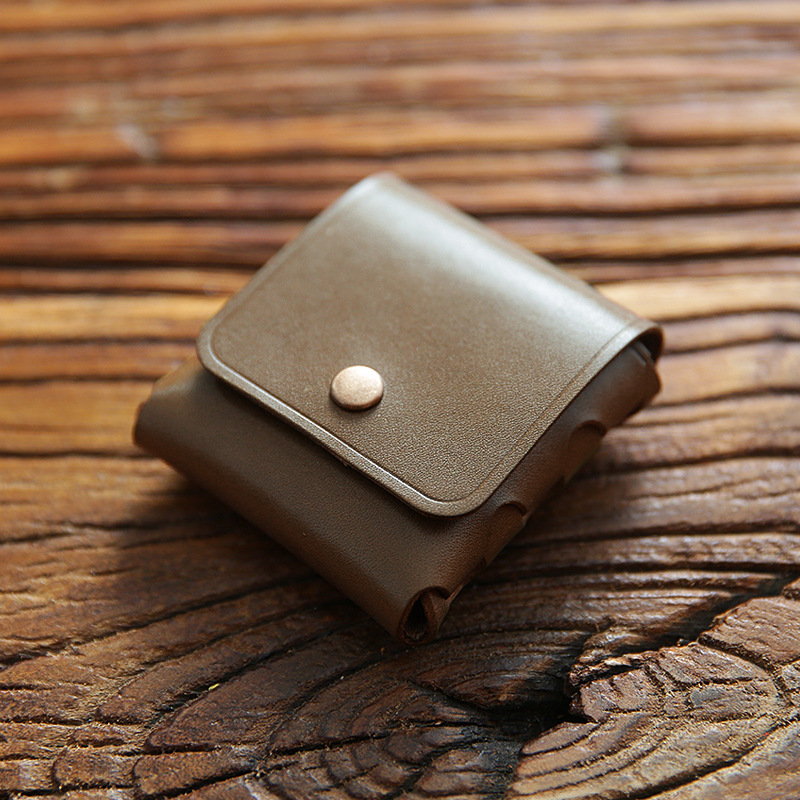 男女のミニ小銭入れは、トップの牛革をなめして、硬貨を掛けて、本革のイヤホンの保護カバーをしています。