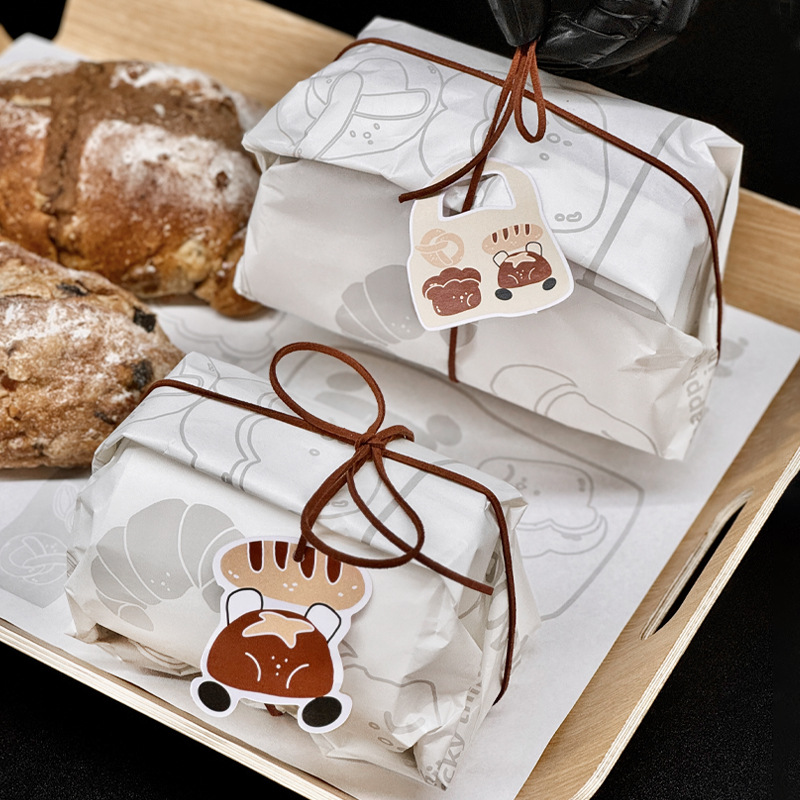 网红面包打包新方式绑绳一次性烘焙吐司包装纸餐盘垫纸托盘纸批发