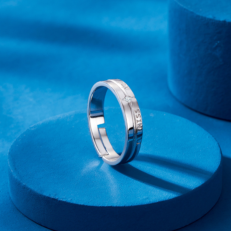 S925 anillo de pareja de plata esterlina Corea del Sur elegante carta con incrustaciones de circón anillo de diseño de nicho abierto para hombres y mujeres