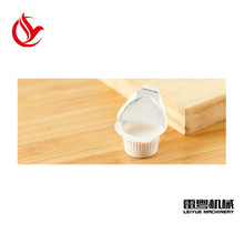 深圳雷粤小型咖啡伴侣泡罩包装机  食品级液体自动灌装封口包装机