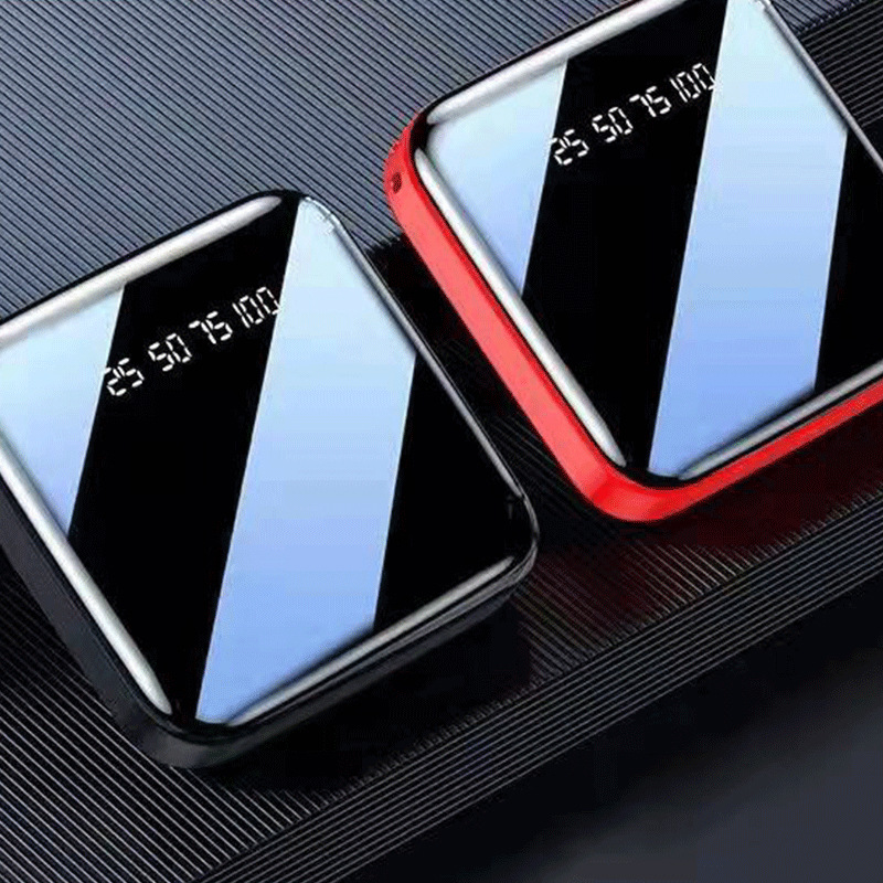 Lámpara LED de visualización digital espejo de doble puerto 20000 mAh compartido teléfono celular cargador al aire libre fuente de alimentación portátil en stock